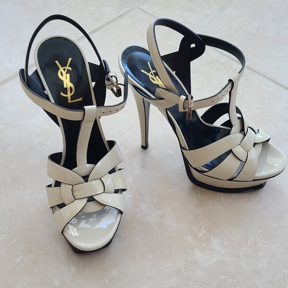 Saint Laurent white with black bottoms size 37.. worn just a handful of times